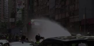 Hong Kong police arrest nearly 200 in first protest under new security law