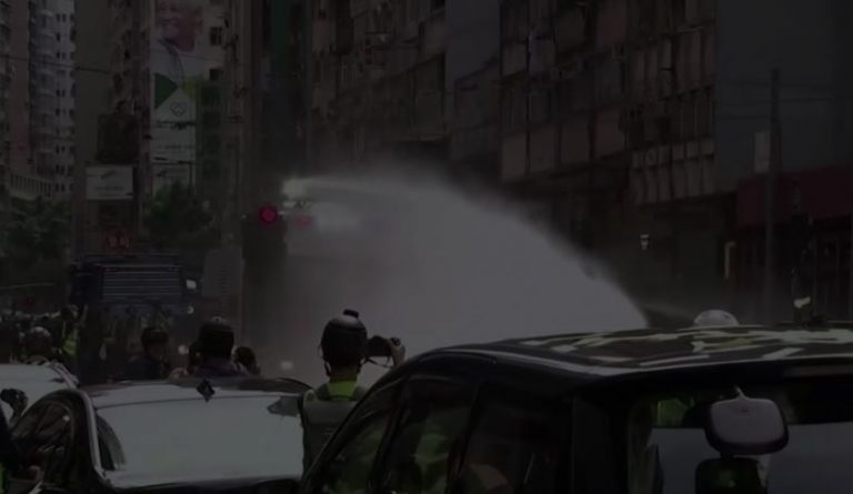 Hong Kong police arrest nearly 200 in first protest under new security law