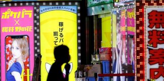 No kissing and disinfect the microphone: Japan nightlife sets its virus rules