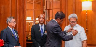 First poppy flower pinned on President to commemorate Remembrance Day