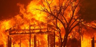 California wildfires kill six, burn area larger than Rhode Island