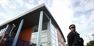 Police sergeant shot dead at police station in London