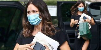 Katharine McPhee shows some leg in a black dress with a slit