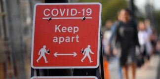 Johnson locks down England as UK COVID-19 cases pass 1 million