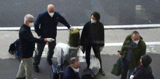 WHO team probing origin of Covid-19 arrives in China