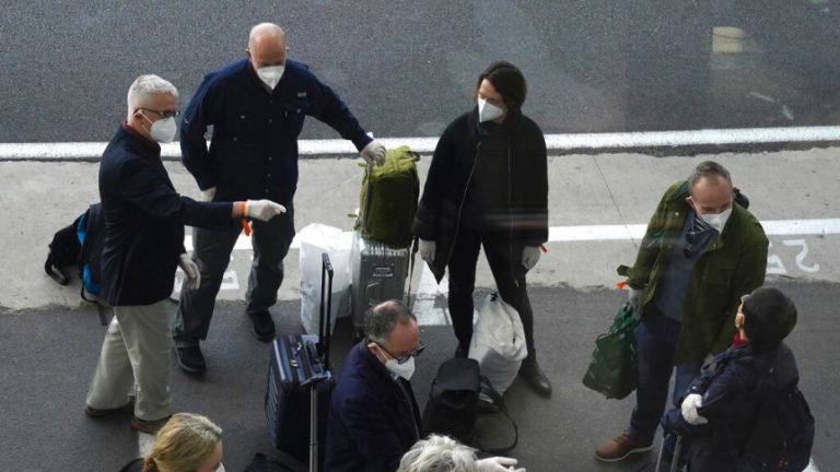 WHO team probing origin of Covid-19 arrives in China