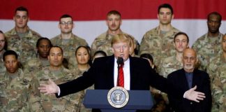 Exclusive: Pentagon presses ahead with Afghanistan troop drawdown despite law barring it