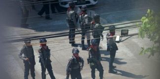 Myanmar security forces raid compound of striking rail workers