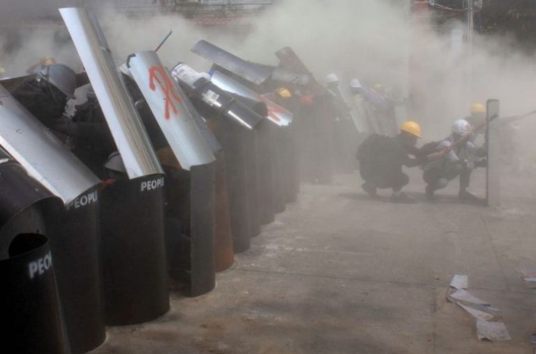 Myanmar forces fire tear gas, stun grenades on protest as UN envoy calls for action