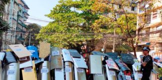 Protesters back on Myanmar streets after night raids by security forces