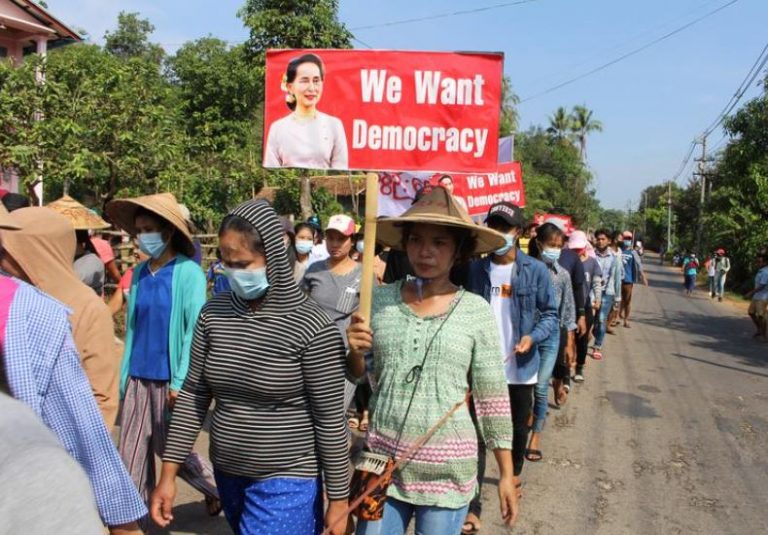 Myanmar protesters paint Yangon red, defying bloody army crackdown