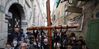 Christians mark Good Friday amid lingering COVID-19 woes